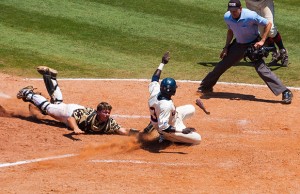 UCONN's Aaron Hill scores the game winner - Photo Don Miller